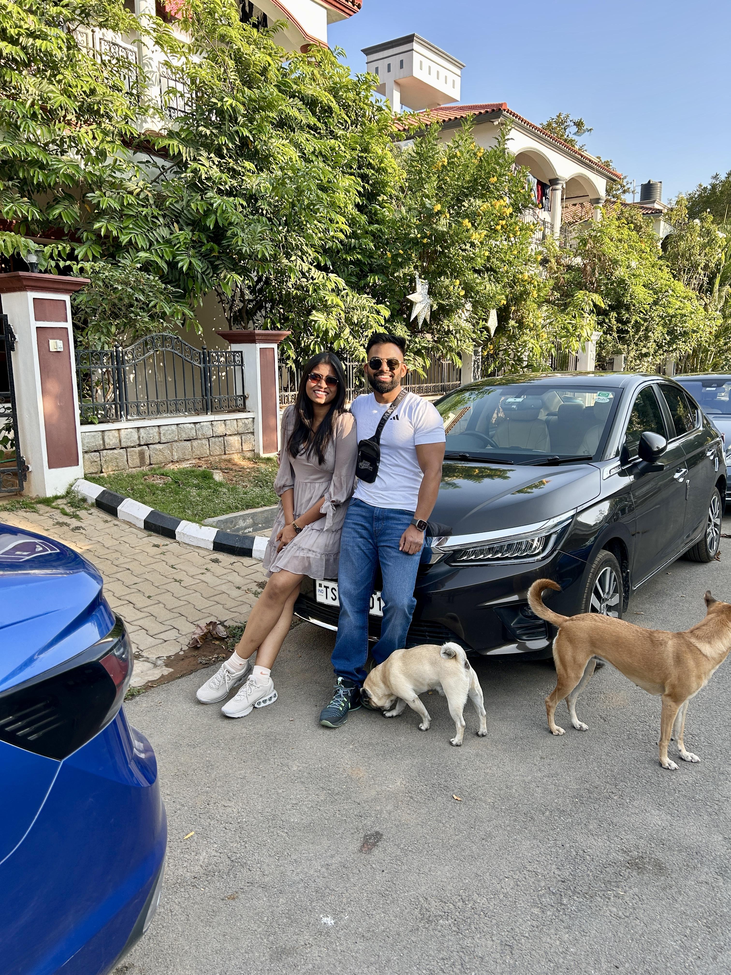 Rhea & Joshua outdoors with Ragnar and Gigi
